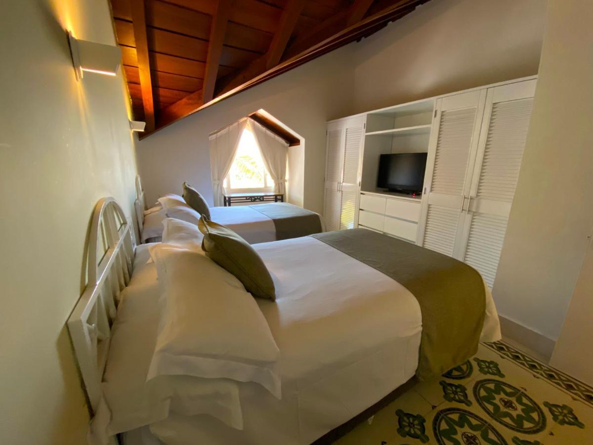 Hotel Las Americas Casa De Playa Cartagena Εξωτερικό φωτογραφία A room at the hotel