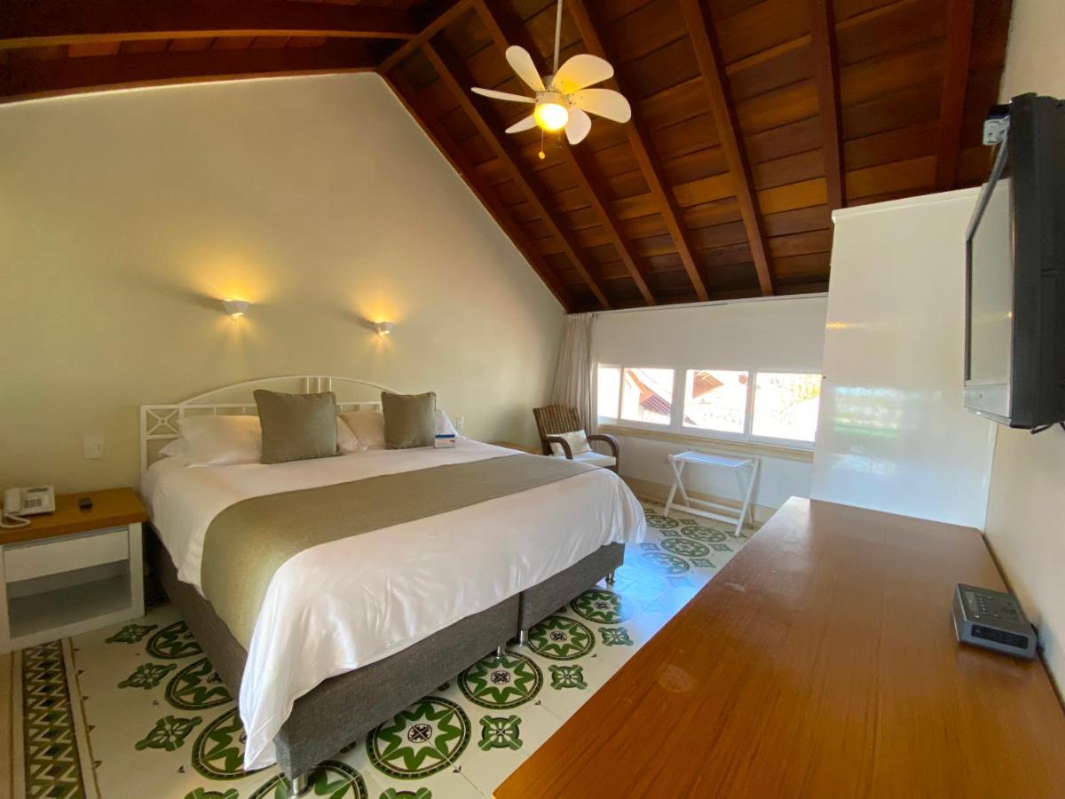 Hotel Las Americas Casa De Playa Cartagena Εξωτερικό φωτογραφία A room at the hotel